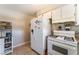 Kitchen featuring modern appliances, tile backsplash and ample counter space at 908 N 24Th St, Las Vegas, NV 89101