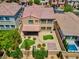 Aerial view of a backyard with a covered patio and desert landscaping at 9643 Wildflower Vista Ave, Las Vegas, NV 89166
