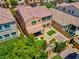 Aerial view of a backyard with desert landscaping and a covered patio at 9643 Wildflower Vista Ave, Las Vegas, NV 89166