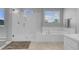 Bathroom featuring separate shower and bathtub at 9643 Wildflower Vista Ave, Las Vegas, NV 89166