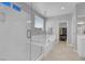 Bathroom featuring glass enclosed shower and a large tub at 9643 Wildflower Vista Ave, Las Vegas, NV 89166