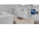 Bathroom with double sinks and view into bedroom at 9643 Wildflower Vista Ave, Las Vegas, NV 89166