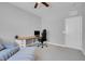 Comfortable bedroom featuring a ceiling fan and seating area at 9643 Wildflower Vista Ave, Las Vegas, NV 89166