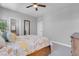 Comfortable bedroom featuring a ceiling fan, neutral walls and a well sized closet at 9643 Wildflower Vista Ave, Las Vegas, NV 89166