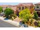 Charming two-story home with desert landscaping and a brick paver driveway at 9643 Wildflower Vista Ave, Las Vegas, NV 89166