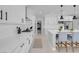 Stylish kitchen featuring quartz countertops, subway tile backsplash, and stainless-steel appliances at 9643 Wildflower Vista Ave, Las Vegas, NV 89166