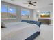 Comfortable main bedroom with ceiling fan and a view at 9643 Wildflower Vista Ave, Las Vegas, NV 89166