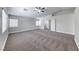 Large bedroom featuring carpet, neutral walls, and multiple entry points to other rooms at 9766 Marcelline Ave, Las Vegas, NV 89148