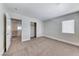 Spacious bedroom features neutral walls, plush carpet, and a large closet at 9766 Marcelline Ave, Las Vegas, NV 89148