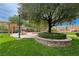 Picturesque community park with picnic tables and well-maintained landscaping, ideal for relaxation and recreation at 9766 Marcelline Ave, Las Vegas, NV 89148