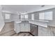 Modern kitchen featuring stainless steel appliances, a breakfast bar and lots of natural light at 9766 Marcelline Ave, Las Vegas, NV 89148