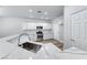 Contemporary kitchen with a stainless steel sink, stainless appliances and quartz countertops at 9766 Marcelline Ave, Las Vegas, NV 89148