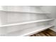 Walk in pantry featuring lots of shelving, modern flooring and neutral paint at 9766 Marcelline Ave, Las Vegas, NV 89148