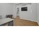 Open-concept living room with hardwood floors and gray walls at 9779 Mosaic Canyon Ct, Las Vegas, NV 89149