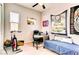 Cozy bedroom featuring a daybed, exercise bike, and ample natural light, perfect for a home office or guest room at 10262 Havasu Falls St, Las Vegas, NV 89141