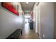Inviting hallway with tile flooring that leads to an open living area, showcasing neutral tones and modern decor at 10262 Havasu Falls St, Las Vegas, NV 89141