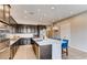 Beautiful kitchen boasts stainless steel appliances, granite countertops, and stylish pendant lighting at 10262 Havasu Falls St, Las Vegas, NV 89141