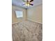 This is a bedroom with a ceiling fan and window at 10455 Alpine Edge Ave, Las Vegas, NV 89129
