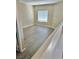 Bonus room with laminate flooring and a window providing natural light at 10455 Alpine Edge Ave, Las Vegas, NV 89129
