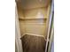 Walk-in closet with a wood shelf and wood-look flooring at 10455 Alpine Edge Ave, Las Vegas, NV 89129