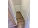 An open closet area with laminate flooring and white walls at 10455 Alpine Edge Ave, Las Vegas, NV 89129