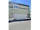 Spacious two-car garage with alley access on modern townhome at 10455 Alpine Edge Ave, Las Vegas, NV 89129