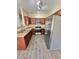 The bright kitchen features stainless steel appliances and ample counter space at 10455 Alpine Edge Ave, Las Vegas, NV 89129