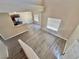Second floor view of the bright living room and kitchen at 10455 Alpine Edge Ave, Las Vegas, NV 89129