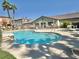 Community pool featuring a fenced in seating area and spa at 10455 Alpine Edge Ave, Las Vegas, NV 89129