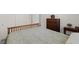Bright bedroom featuring a wooden bed frame, dresser, neutral walls, and dual door closet at 10951 Stone Crossing Ave, Las Vegas, NV 89166