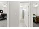 Hallway view of an office, full bathroom and another bedroom at 10951 Stone Crossing Ave, Las Vegas, NV 89166