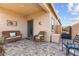 Cozy covered patio featuring a seating area and paver flooring, perfect for outdoor relaxation at 10951 Stone Crossing Ave, Las Vegas, NV 89166