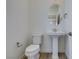 Elegant powder room with pedestal sink and modern fixtures at 11552 Ashy Storm Ave, Las Vegas, NV 89138