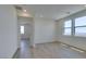 Large, bright bedroom with two windows, and hard surface floors at 11552 Ashy Storm Ave, Las Vegas, NV 89138