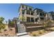 Exterior view of a modern home, showcasing landscaping, and community design at 11552 Ashy Storm Ave, Las Vegas, NV 89138