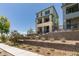 Contemporary home with manicured front yard and modern architectural design at 11552 Ashy Storm Ave, Las Vegas, NV 89138