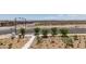 New construction with young trees along the street in front of the house at 11552 Ashy Storm Ave, Las Vegas, NV 89138