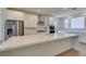 Spacious kitchen with large quartz island and modern appliances at 11552 Ashy Storm Ave, Las Vegas, NV 89138