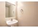 Powder room featuring modern sink, vanity, and fixtures at 11625 Cabo Del Verde Ave, Las Vegas, NV 89138