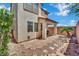 Inviting backyard featuring a covered patio with a grill, perfect for outdoor dining and entertaining guests at 11787 Fern Creek Ln, Las Vegas, NV 89183