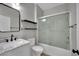 Clean bathroom with a marble vanity top, a glass-enclosed shower, and modern fixtures at 11787 Fern Creek Ln, Las Vegas, NV 89183