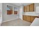 Bright kitchen area with ample sunlight and wood cabinets at 11787 Fern Creek Ln, Las Vegas, NV 89183