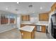 Bright kitchen with stainless steel appliances and ample cabinet space at 11787 Fern Creek Ln, Las Vegas, NV 89183