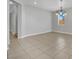 Bright living room with tile flooring and chandelier lighting at 11787 Fern Creek Ln, Las Vegas, NV 89183