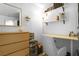 Bright bedroom featuring a desk area, ample storage, and a cozy, modern design at 123 Cedar St, Henderson, NV 89015