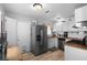 Modern kitchen with stainless steel appliances, butcher block countertops, and white cabinetry at 123 Cedar St, Henderson, NV 89015