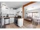 Open kitchen with stainless appliances, butcher block countertops, and open living area at 123 Cedar St, Henderson, NV 89015