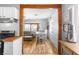 Open concept kitchen view into dining and living area with bright natural light at 123 Cedar St, Henderson, NV 89015