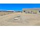 Exterior view of the back of house, showcasing the large lot at 1351 Huckleberry St, Pahrump, NV 89048