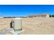 Exterior view of the home featuring a pressure tank in the yard at 1351 Huckleberry St, Pahrump, NV 89048